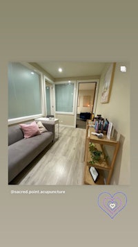 a picture of a living room with a couch
